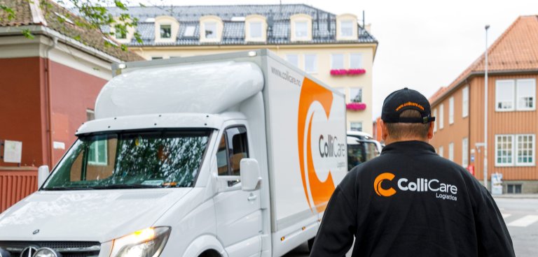 ColliCare driver walking towards ColliCare truck in Trondheim